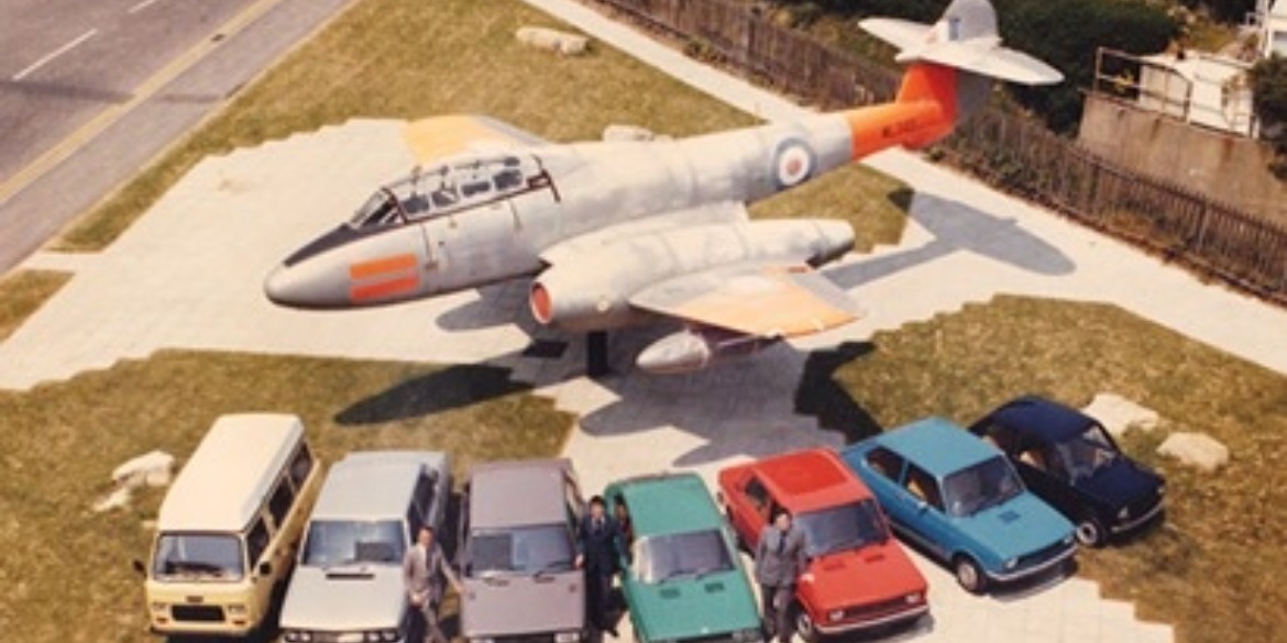 The Gloster Meteor, a plane flown by John Wakeford in the RAF, outside the Bo Peep Filling Station and Fiat Dealers